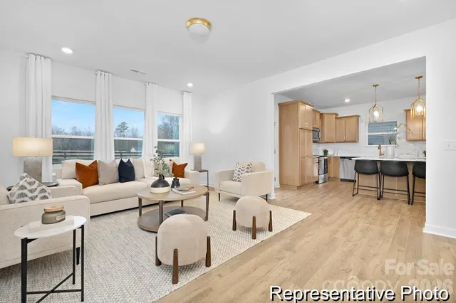 a living room with furniture and a table