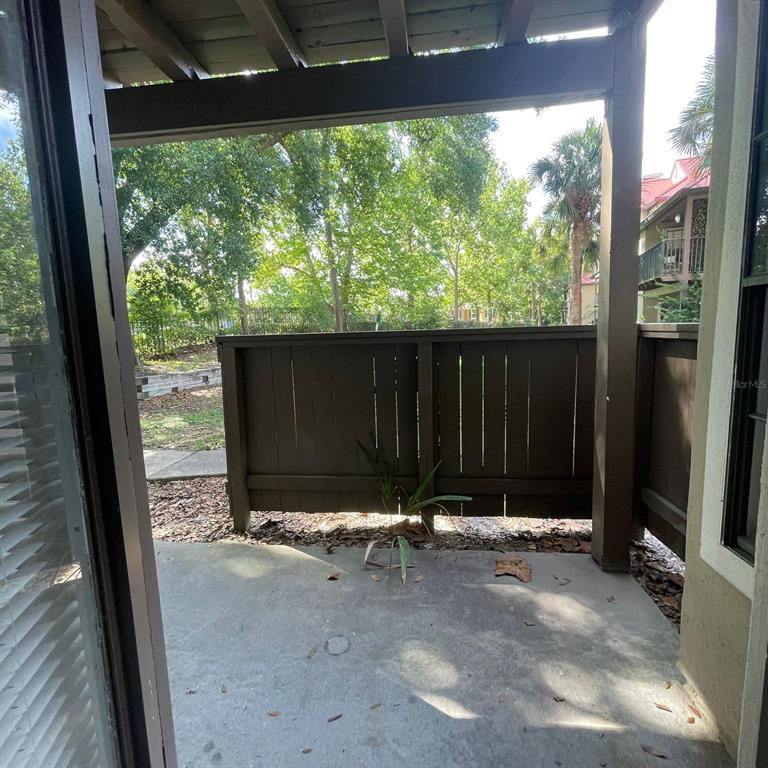 238 Afton Square, Unit 103 Altamonte Springs, FL 32714 - Photo 16 of 16 a backyard of a house with lots of green space