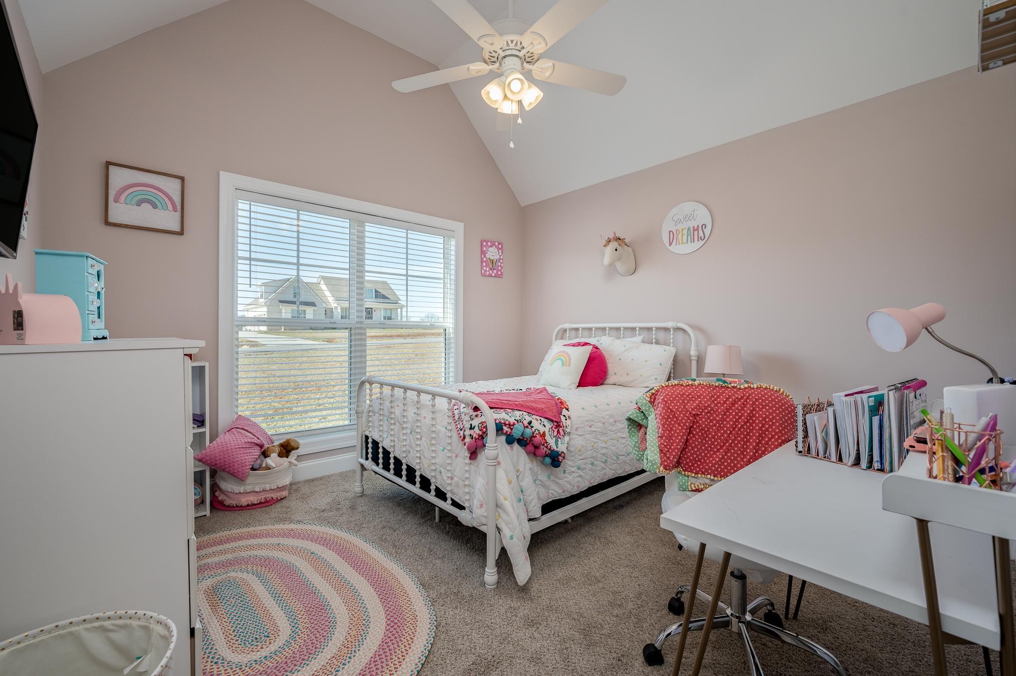 105 Autumn Cove Road Bell Buckle, TN 37020 - Photo 16 of 32 a bedroom with furniture and a bed