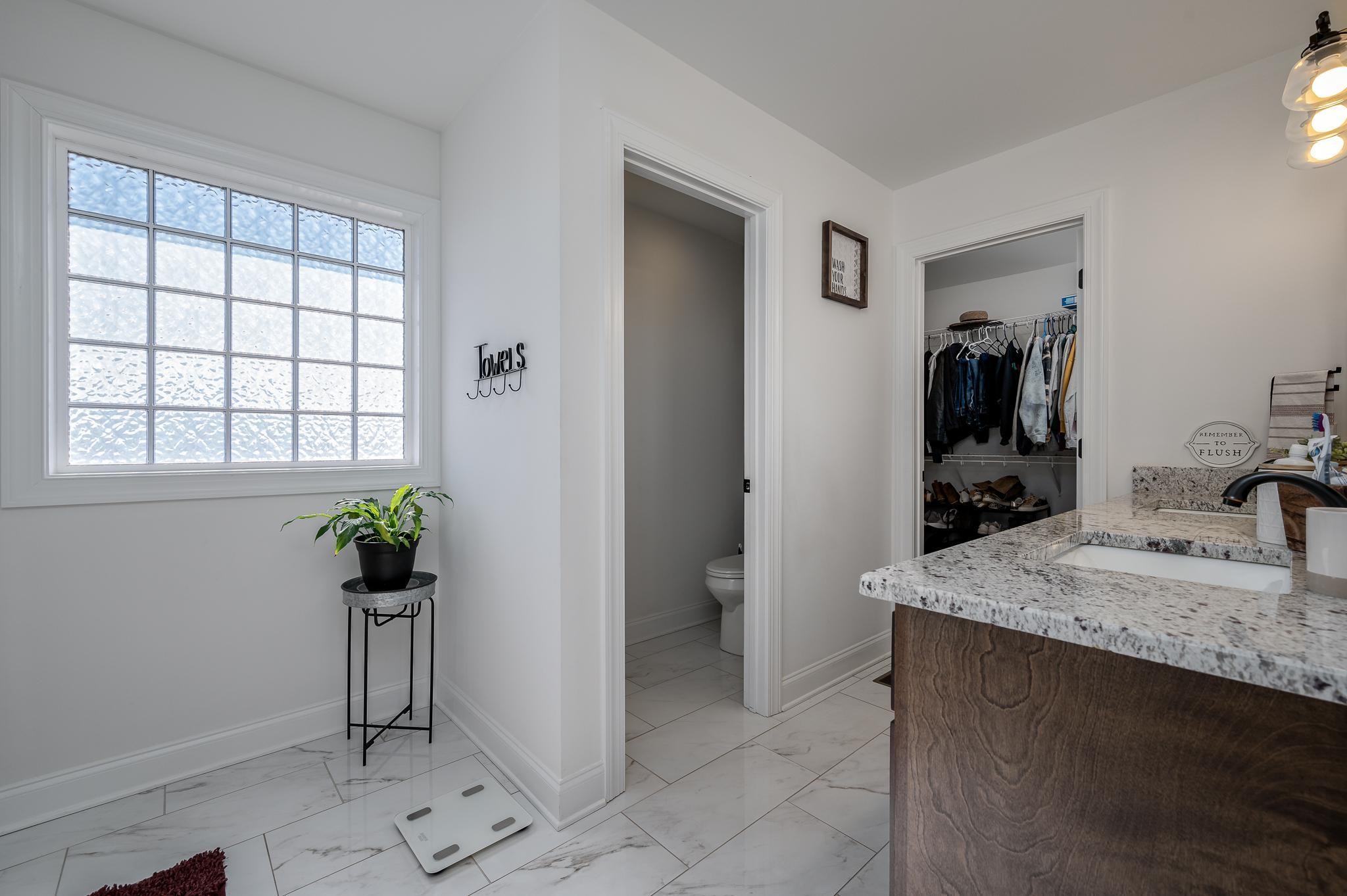105 Autumn Cove Road Bell Buckle, TN 37020 - Photo 17 of 32 a room with a sink and a mirror
