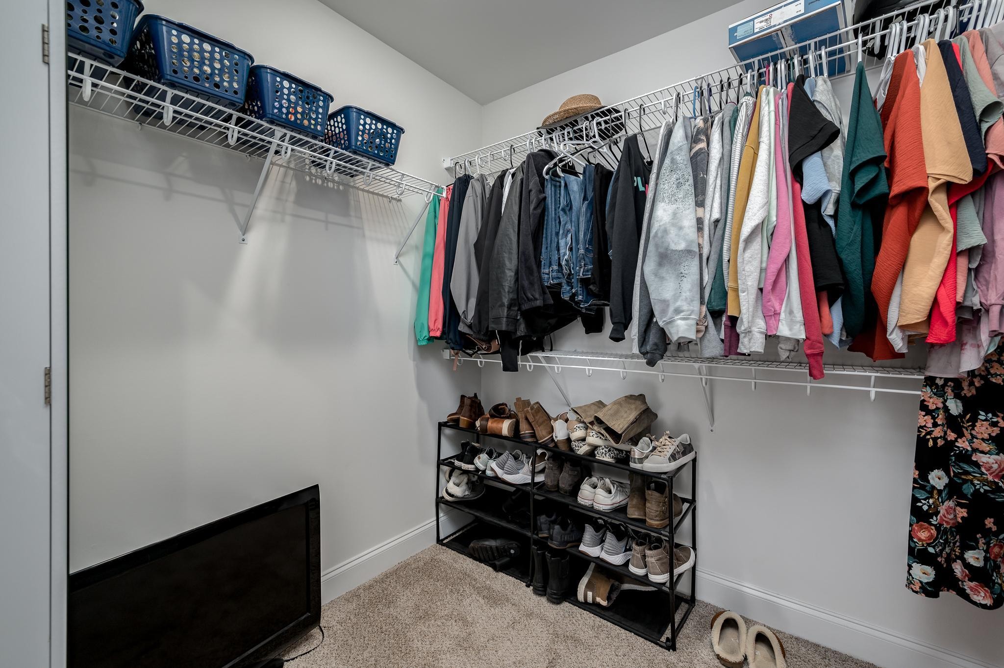 105 Autumn Cove Road Bell Buckle, TN 37020 - Photo 19 of 32 a view of walk in closet with clothes and shoes