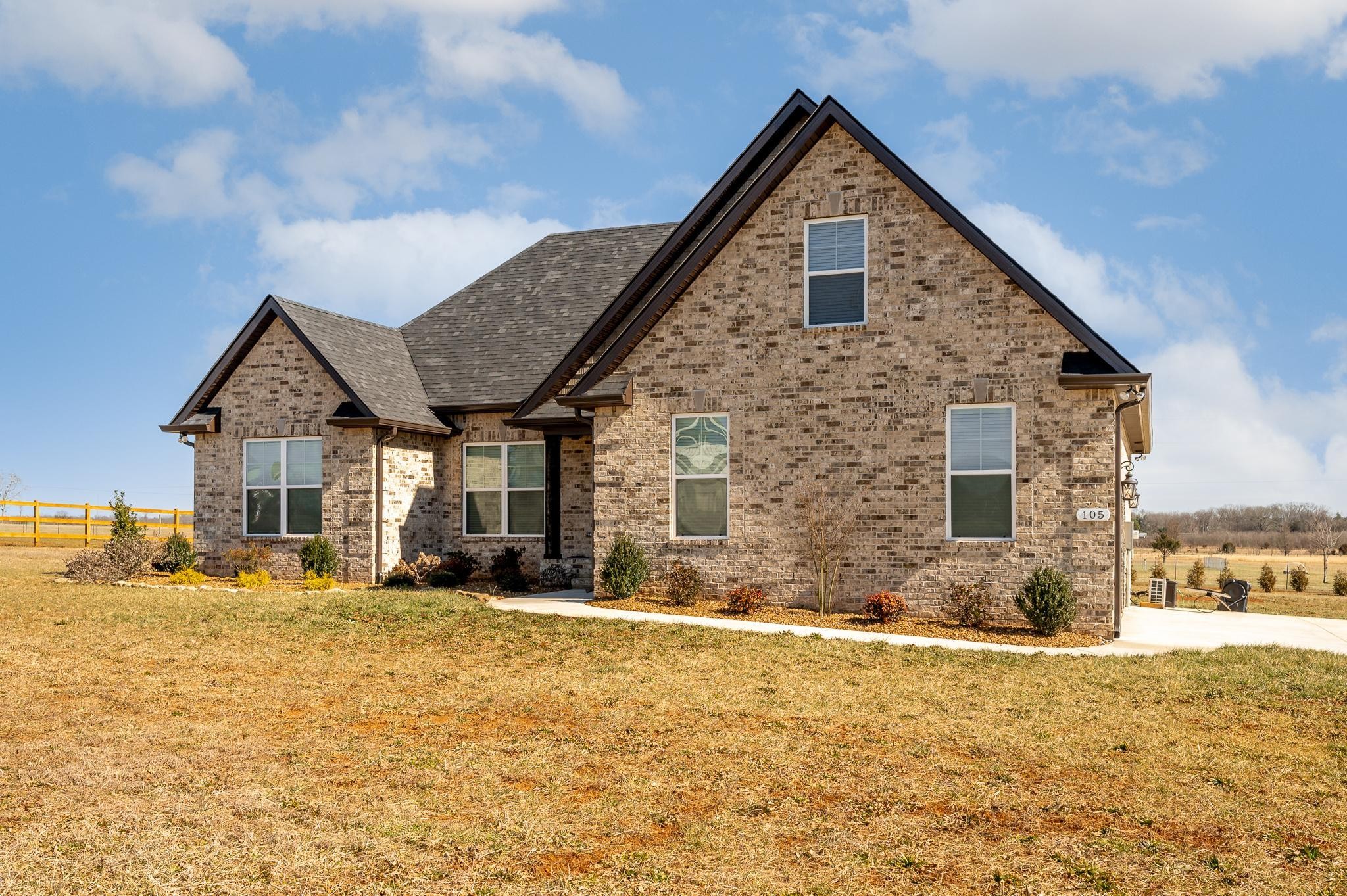 105 Autumn Cove Road Bell Buckle, TN 37020 - Photo 2 of 32 a front view of a house with a yard