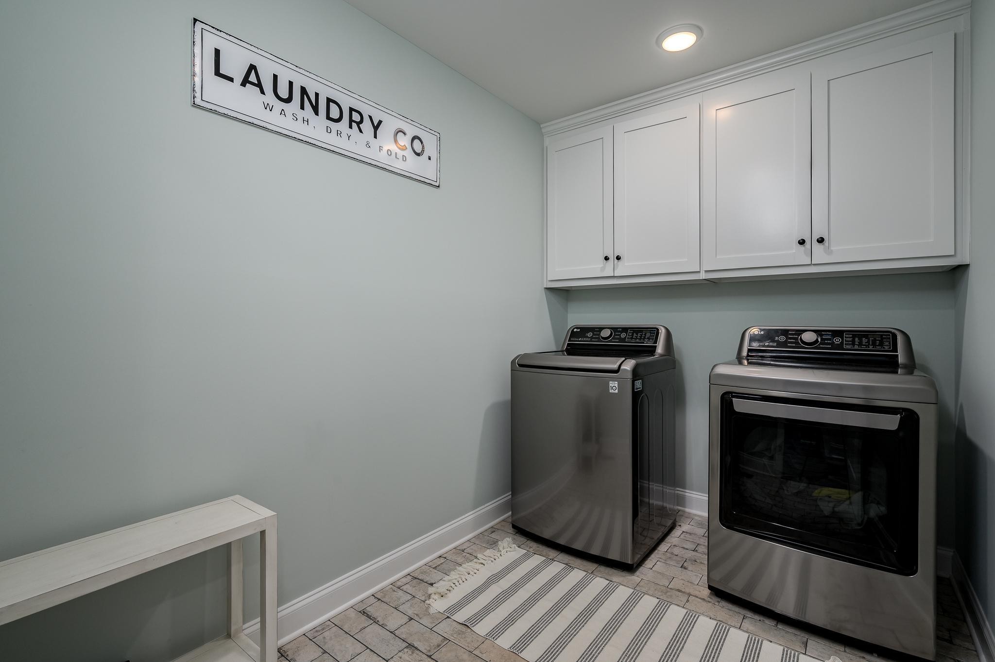 105 Autumn Cove Road Bell Buckle, TN 37020 - Photo 21 of 32 a view of a storage and utility room with washer and dryer