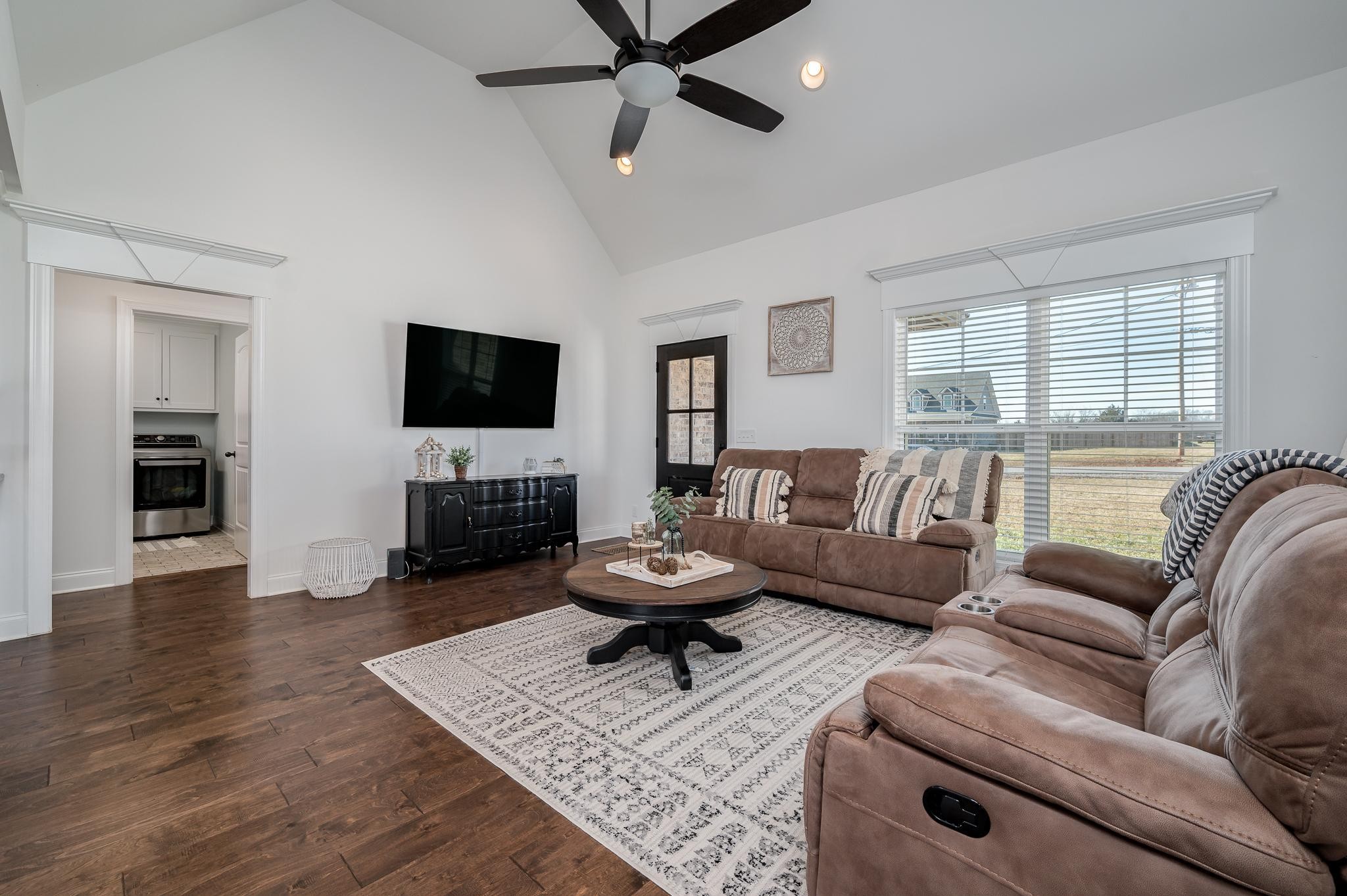105 Autumn Cove Road Bell Buckle, TN 37020 - Photo 9 of 32 a living room with fireplace furniture and a flat screen tv