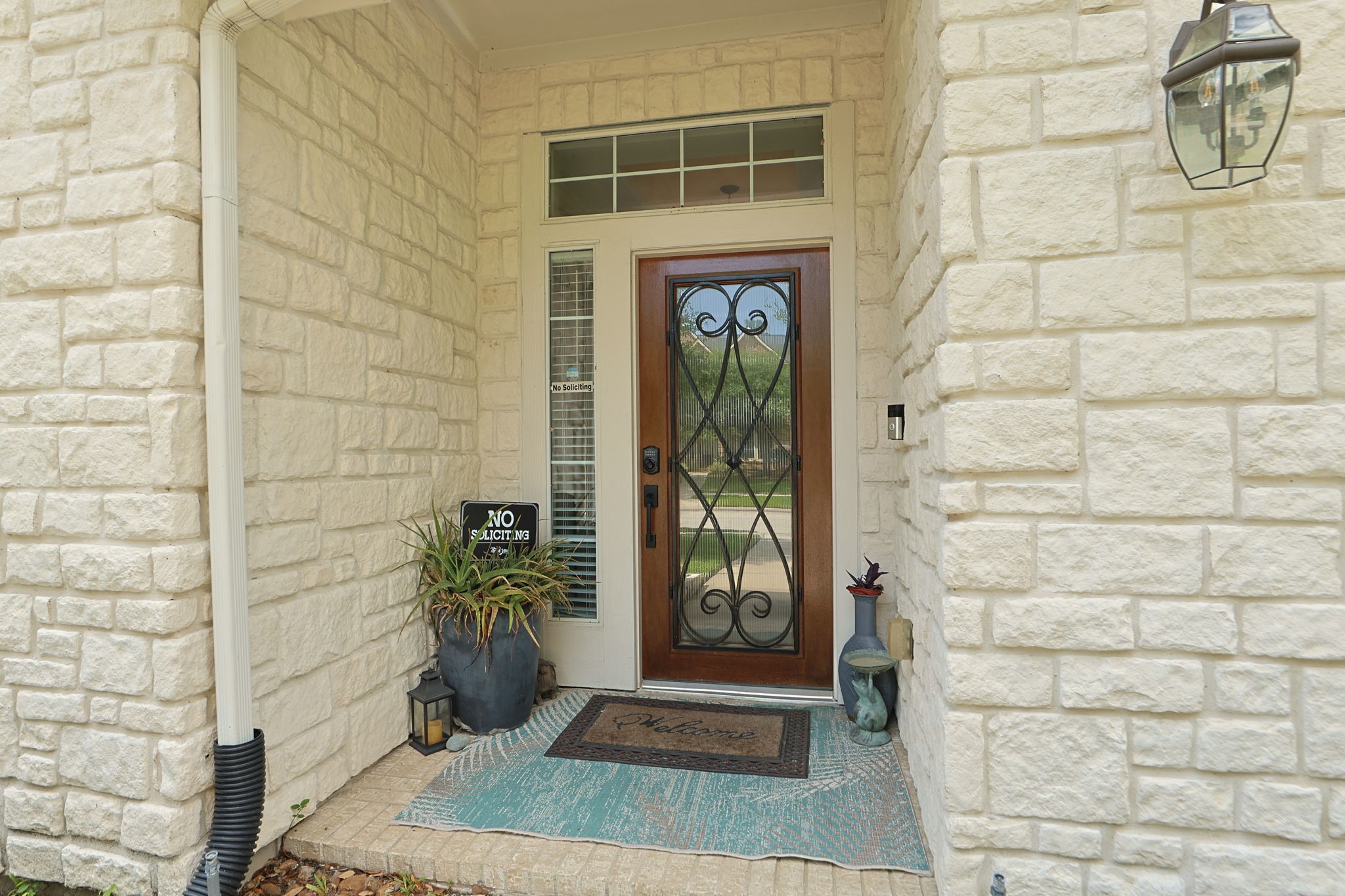 20410 Misty Crossing Lane Spring, TX 77379 - Photo 4 of 50 Welcome home to this charming residence, where an stone facade greet you with warmth and elegance.