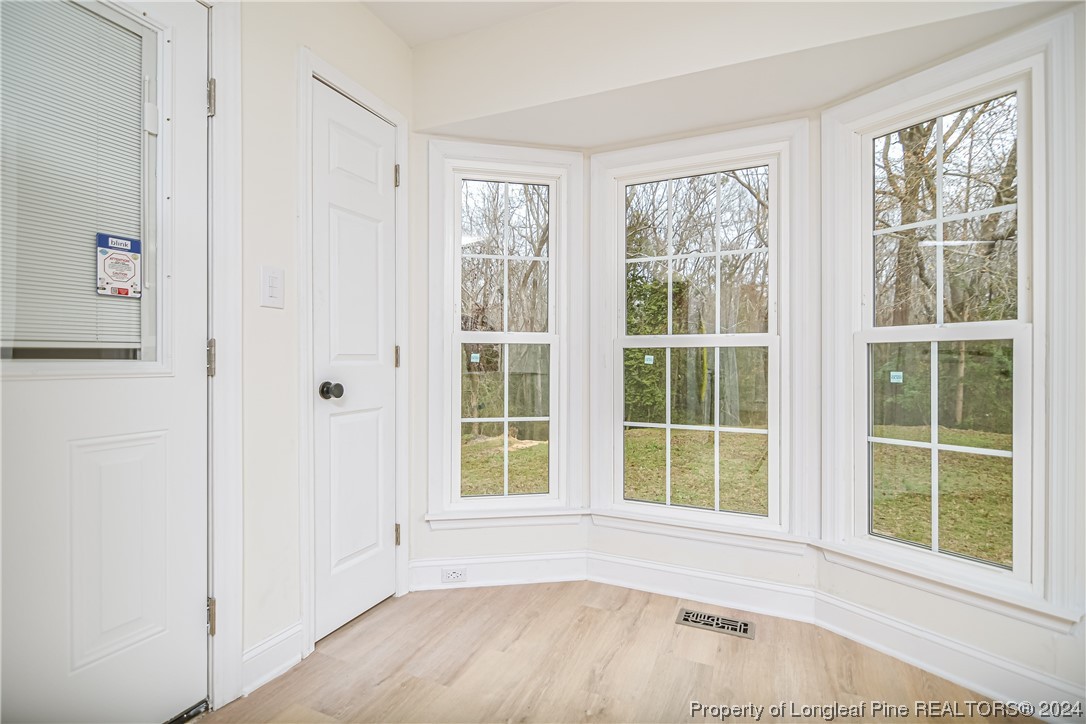 2251 Ridge Manor Drive Fayetteville, NC 28306 - Photo 8 of 25 a view of an empty room with a window