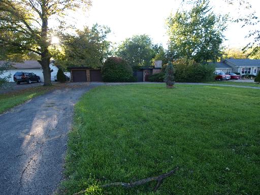 1136 North Randall Road Aurora, IL 60506 - Photo 1 of 1 a view of a park with trees and plants