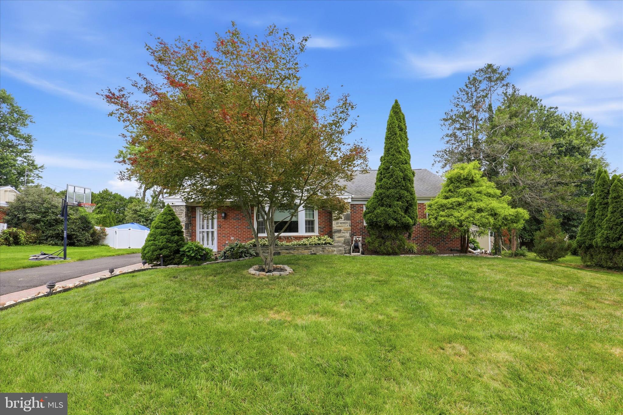 3155 Manor Road Huntingdon Valley, PA 19006 - Photo 2 of 31 a view of a house with a yard and tree s
