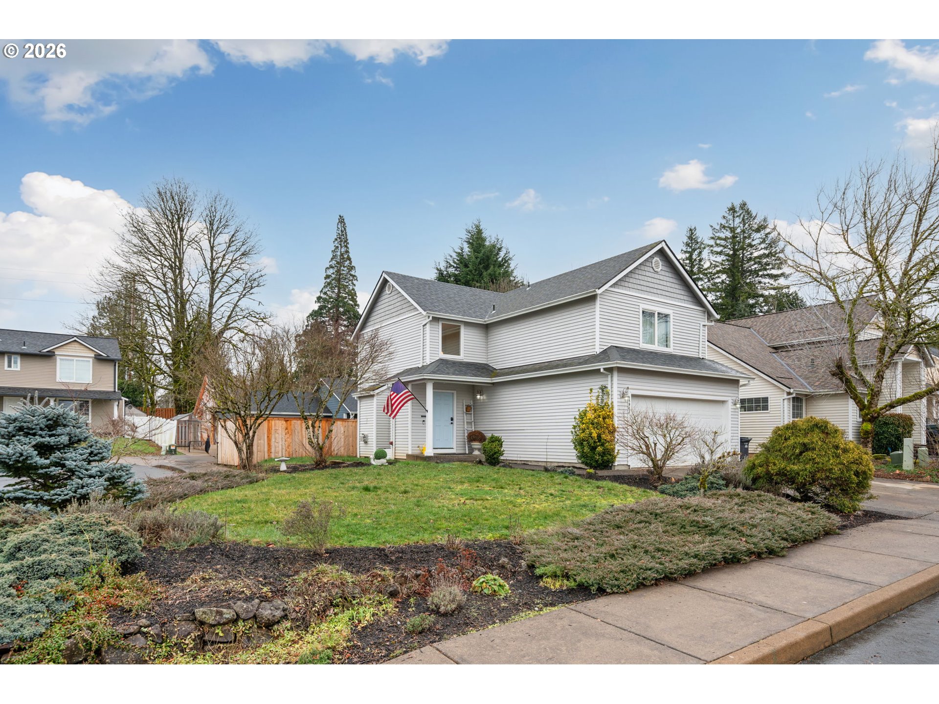a view of front of house with a yard