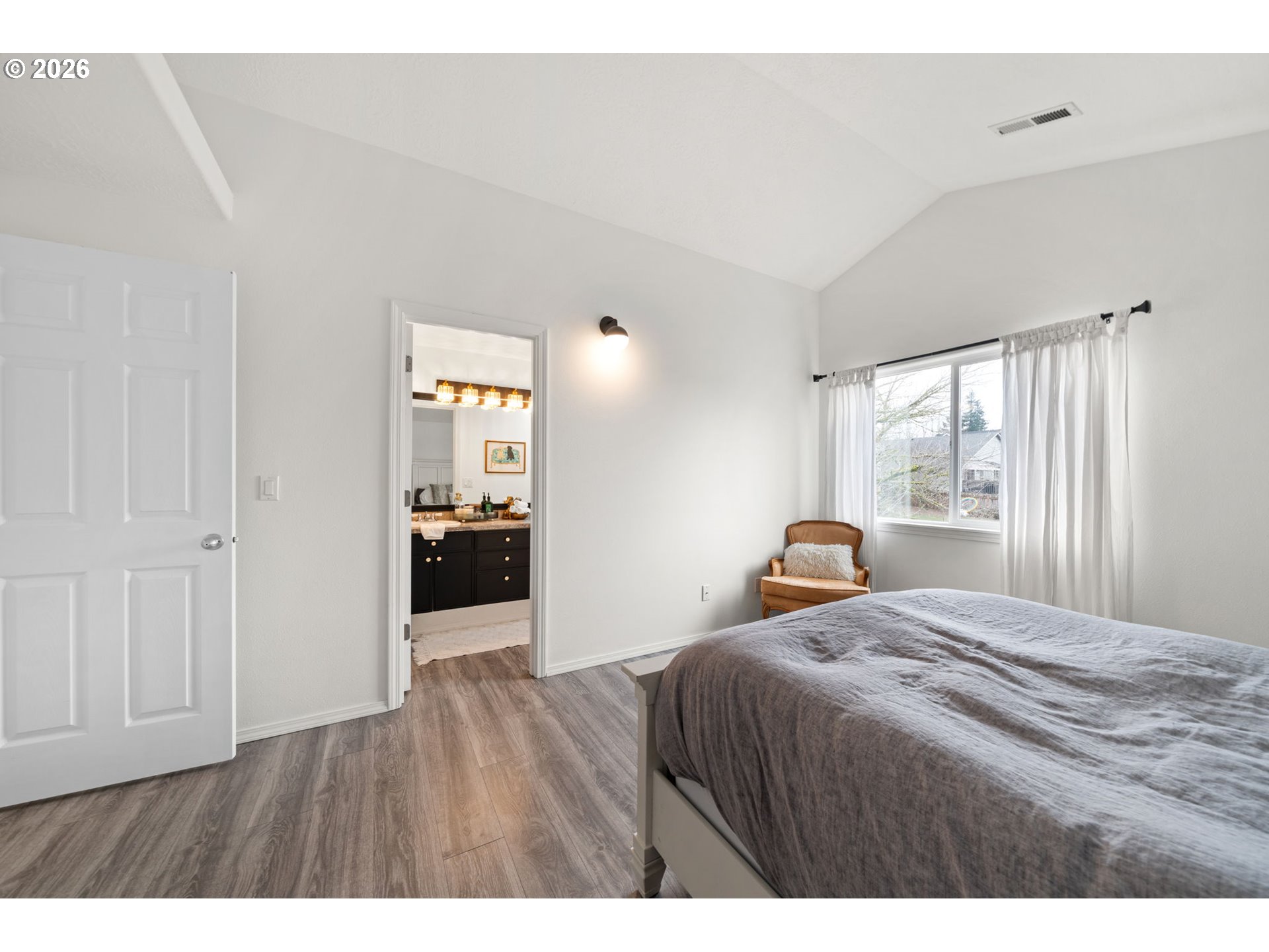 15902 Dreamcatcher Avenue Sandy, OR 97055 - Photo 20 of 32 a bedroom with a bed and wooden floor