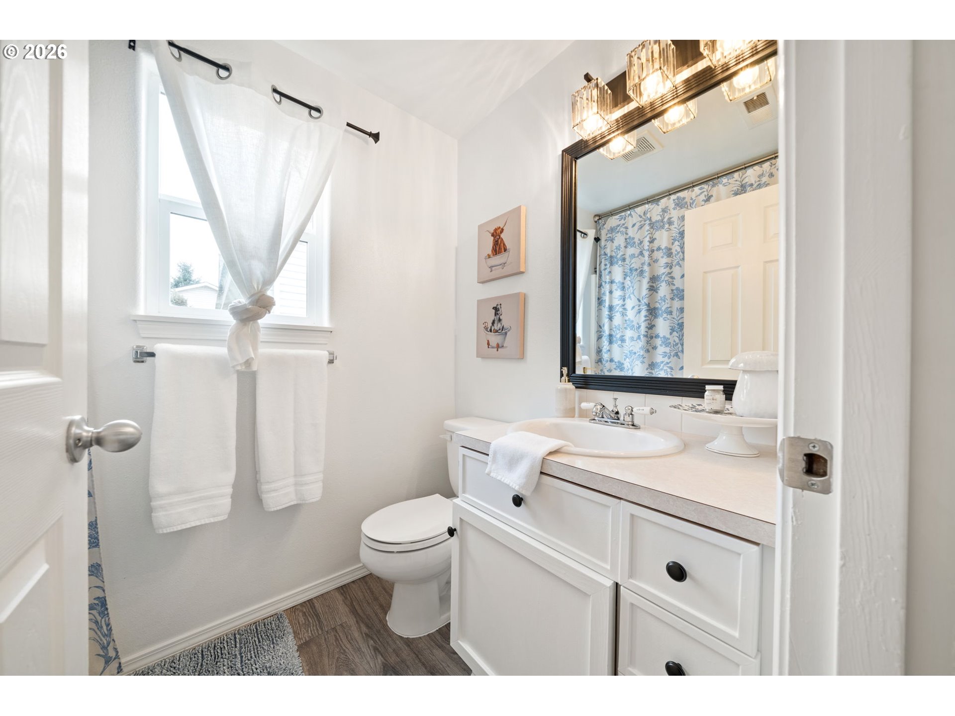 15902 Dreamcatcher Avenue Sandy, OR 97055 - Photo 24 of 32 a bathroom with a granite countertop sink mirror vanity and toilet