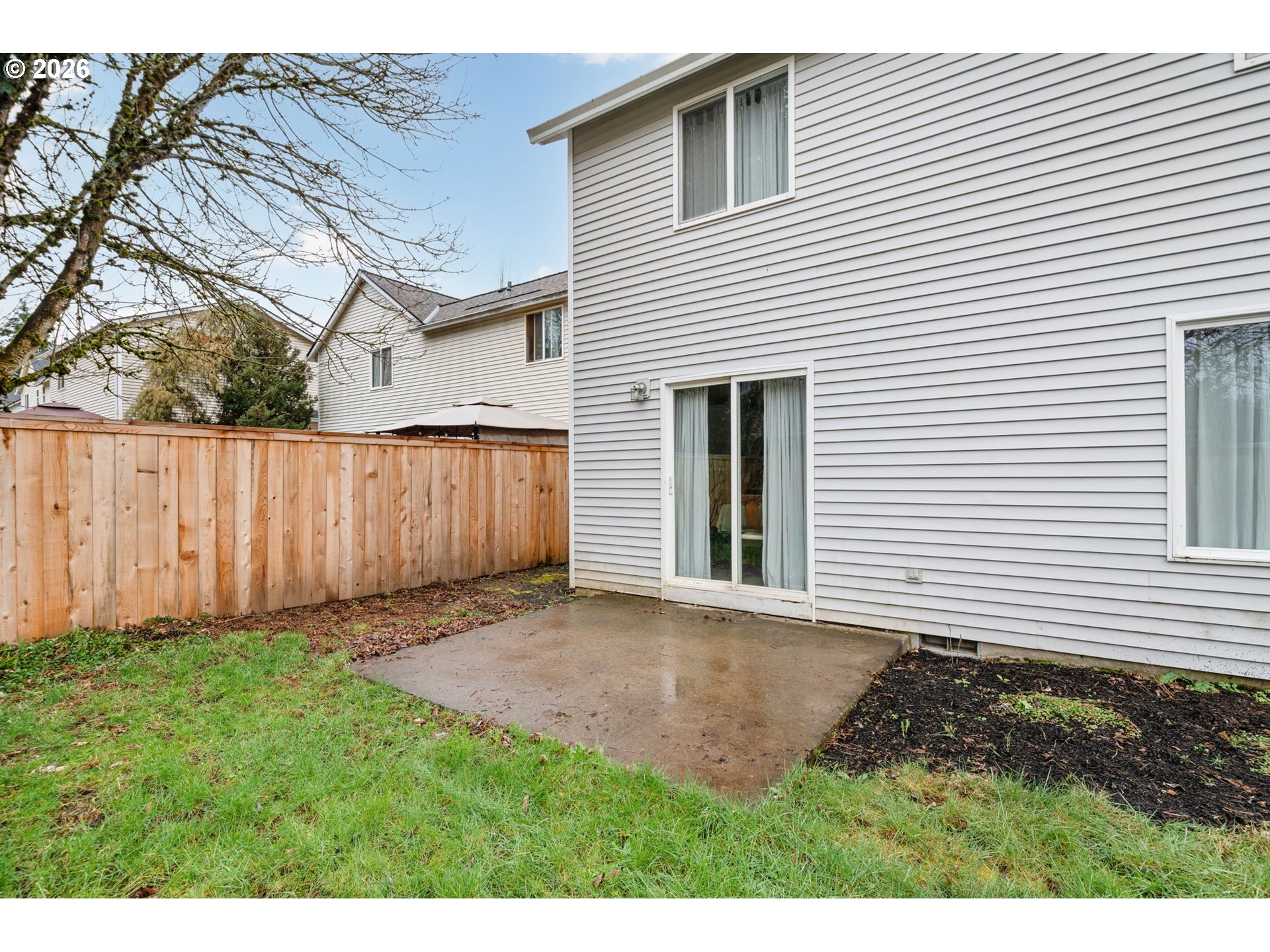 15902 Dreamcatcher Avenue Sandy, OR 97055 - Photo 29 of 32 a view of a backyard with wooden fence