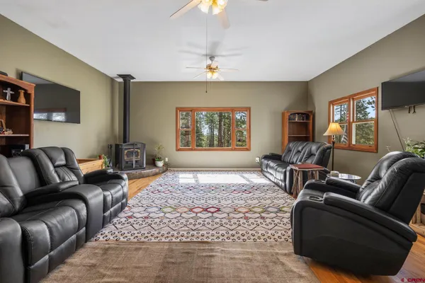 a room with furniture and a wooden floor