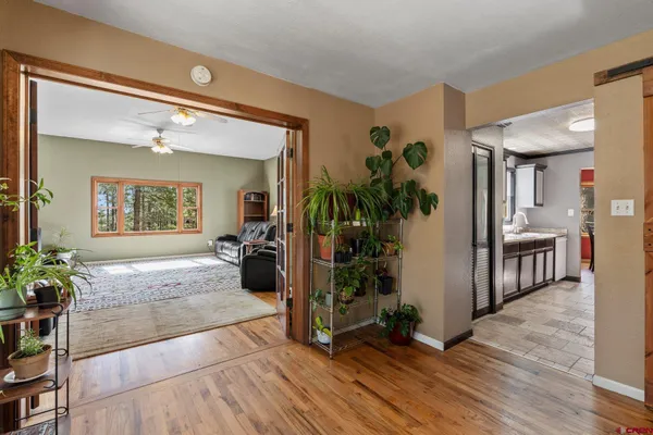 a living room with furniture and a window