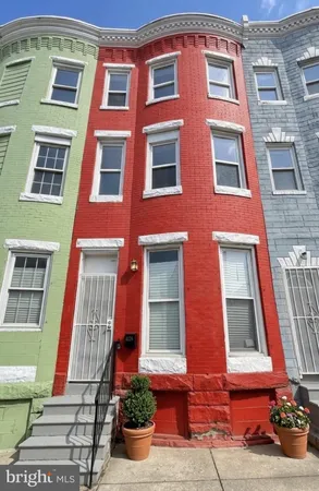 a front view of a multi story residential apartment building