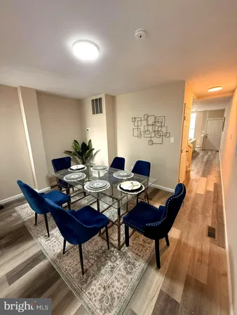 a workspace with furniture and a rug