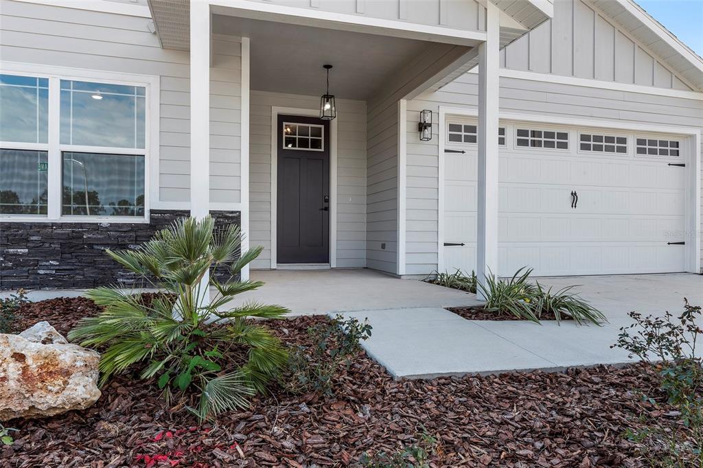 6703 Southwest 10th Lane Gainesville, FL 32607 - Photo 2 of 33 a view of a entryway front of house