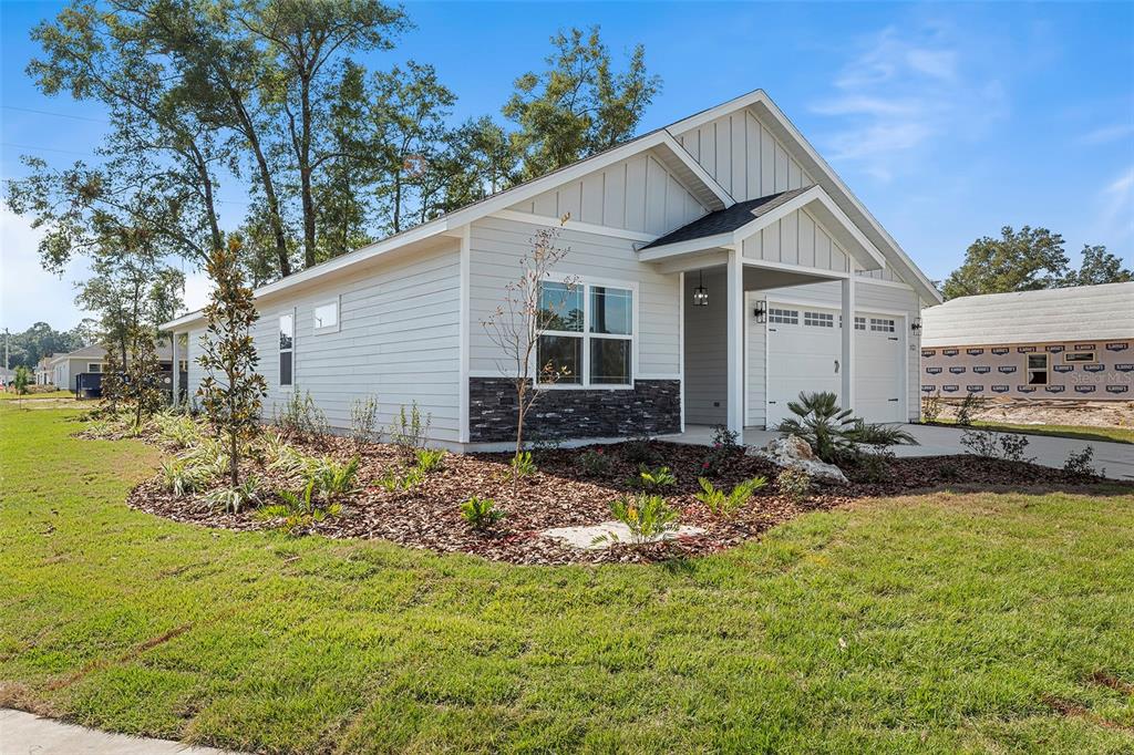 6703 Southwest 10th Lane Gainesville, FL 32607 - Photo 3 of 33 a front view of house with garden