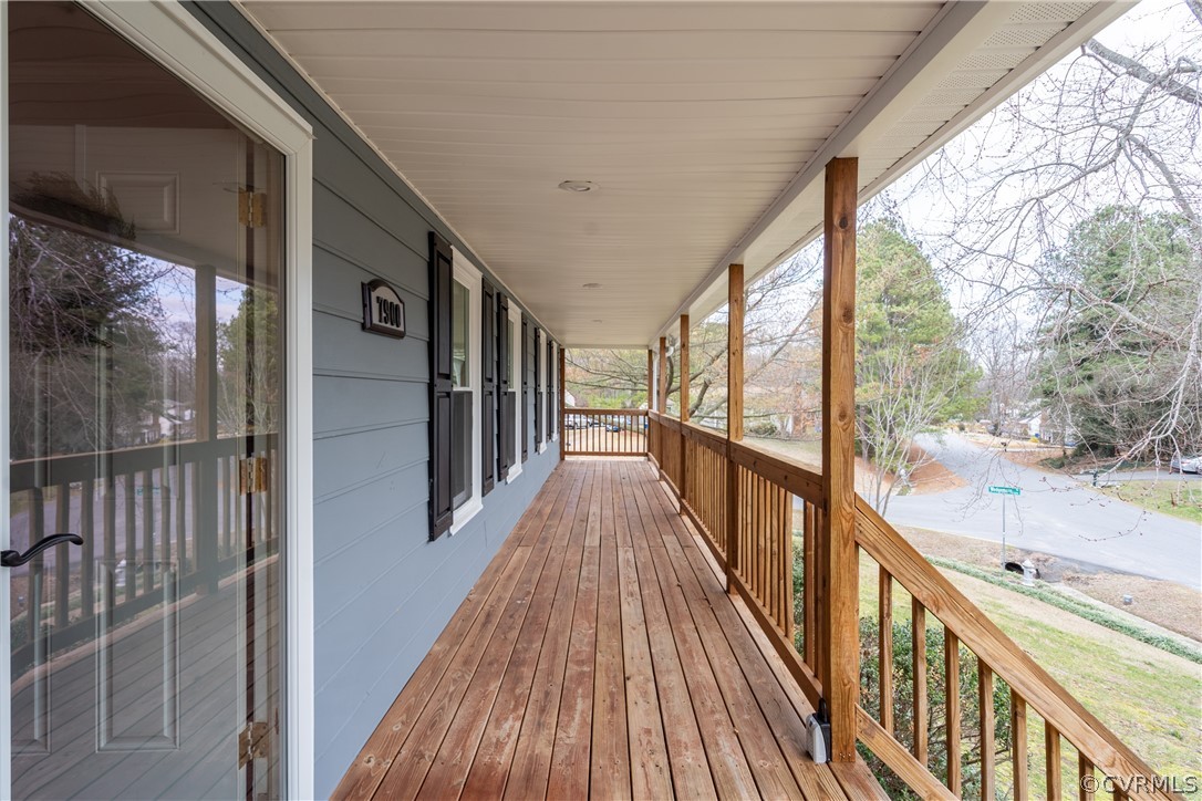 7900 Valencia Road Chesterfield, VA 23832 - Photo 4 of 44 a view of a balcony with wooden floor