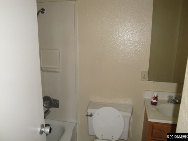 1265 Beldon Way Reno, NV 89503 - Photo 9 of 9 a bathroom with a toilet and a shower