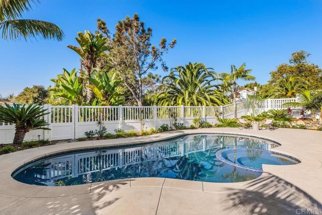 a view of swimming pool from a balcony