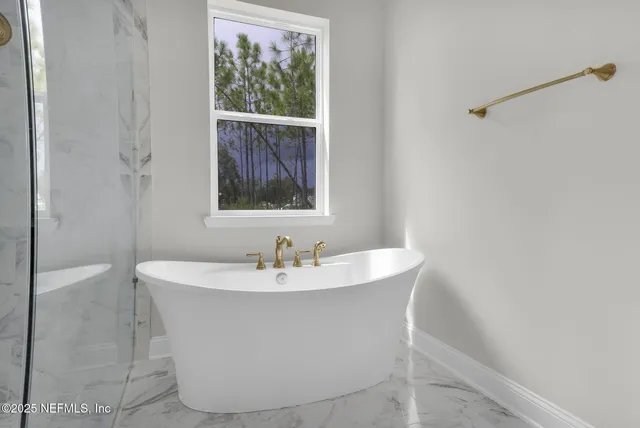 a bathroom with a bath tub