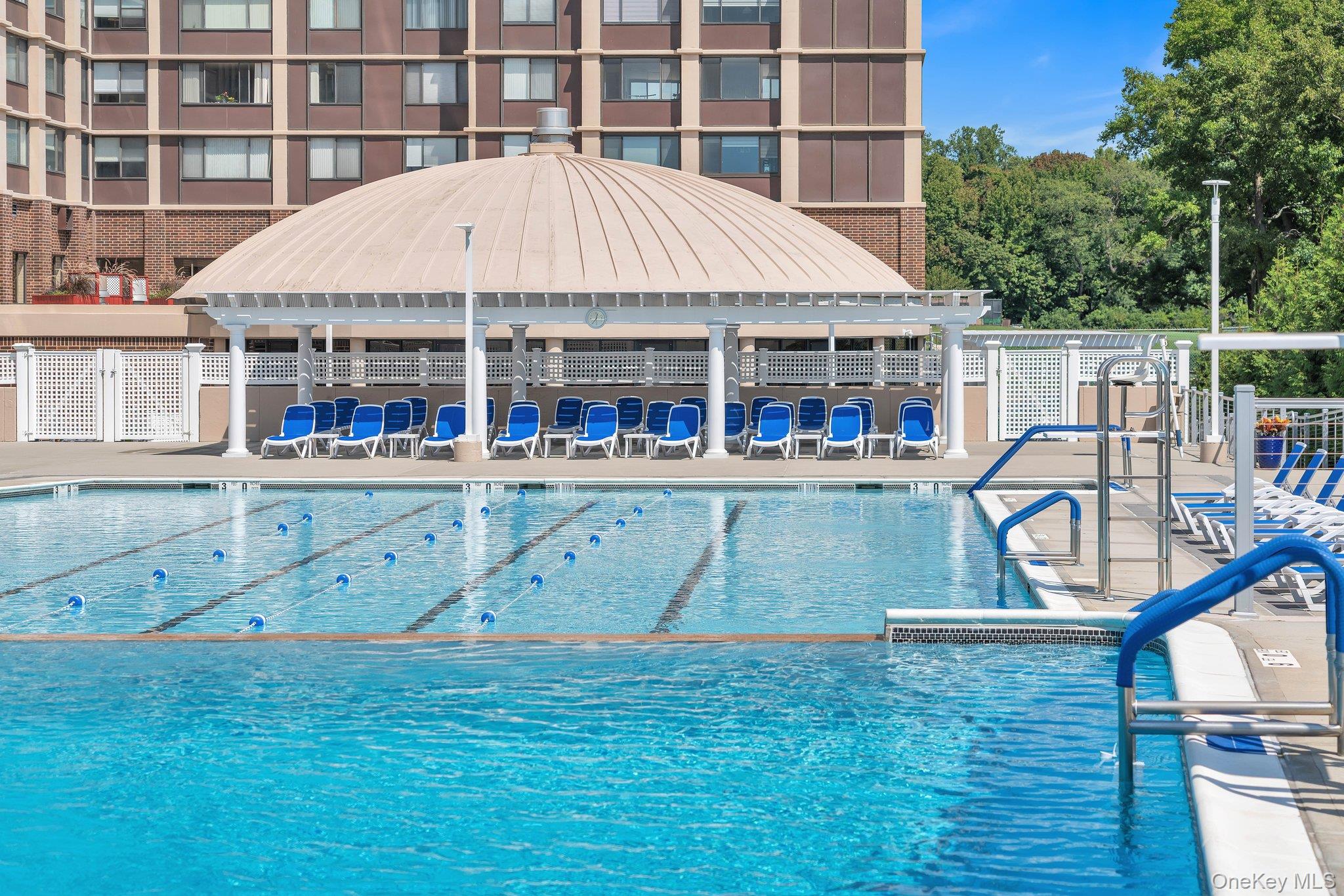 269 Grand Central Parkway, Unit 32O Queens, NY 11005 - Photo 31 of 33 a view of a house with a swimming pool