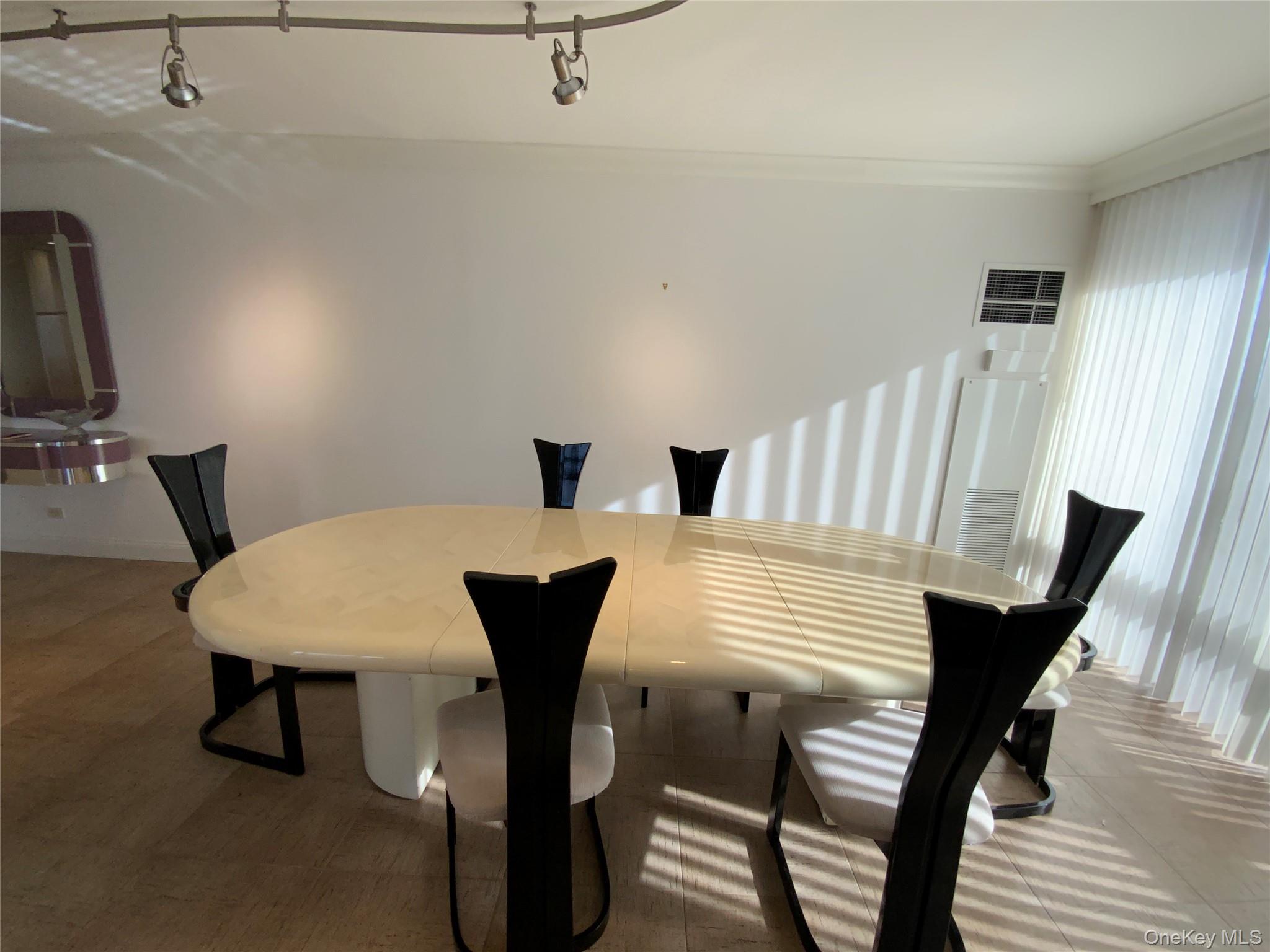 269 Grand Central Parkway, Unit 32O Queens, NY 11005 - Photo 4 of 33 a view of a dining room with furniture