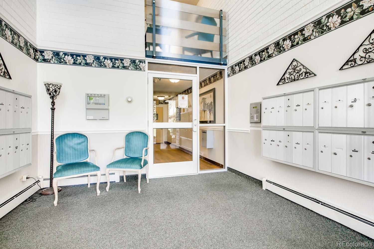 9340 Center Avenue, Unit 6B Denver, CO 80247 - Photo 12 of 40 a view of a chairs and table in a room