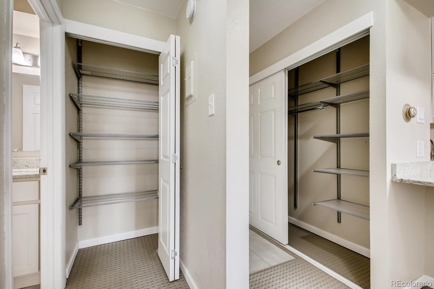 9340 Center Avenue, Unit 6B Denver, CO 80247 - Photo 23 of 40 a view of walk in closet with empty racks