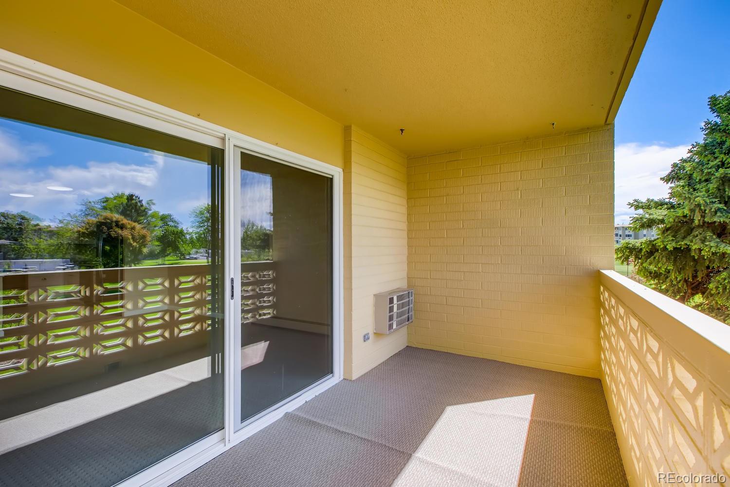 9340 Center Avenue, Unit 6B Denver, CO 80247 - Photo 26 of 40 a view of balcony with city view