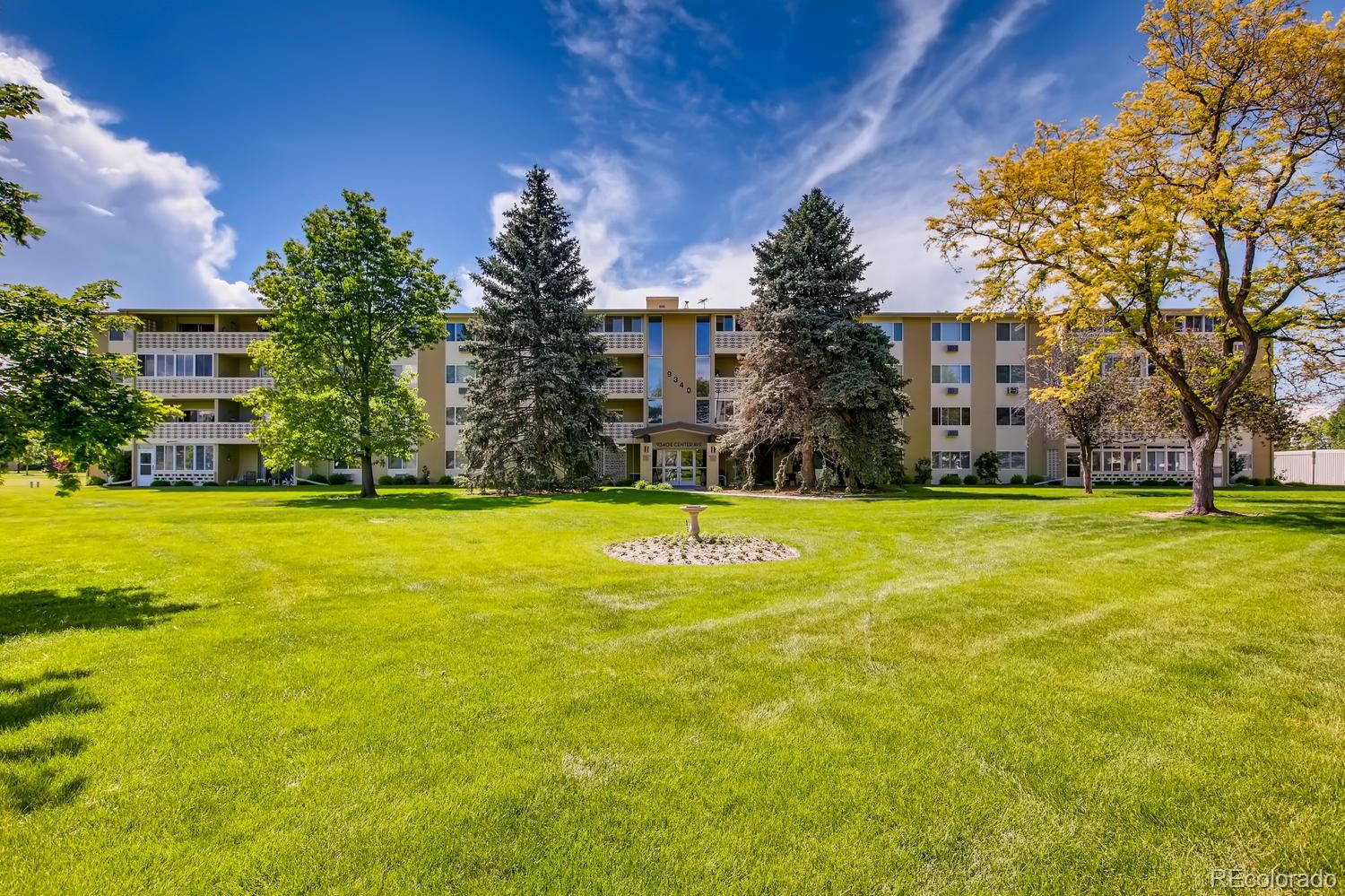 9340 Center Avenue, Unit 6B Denver, CO 80247 - Photo 31 of 40 a view of swimming pool is middle in the garden
