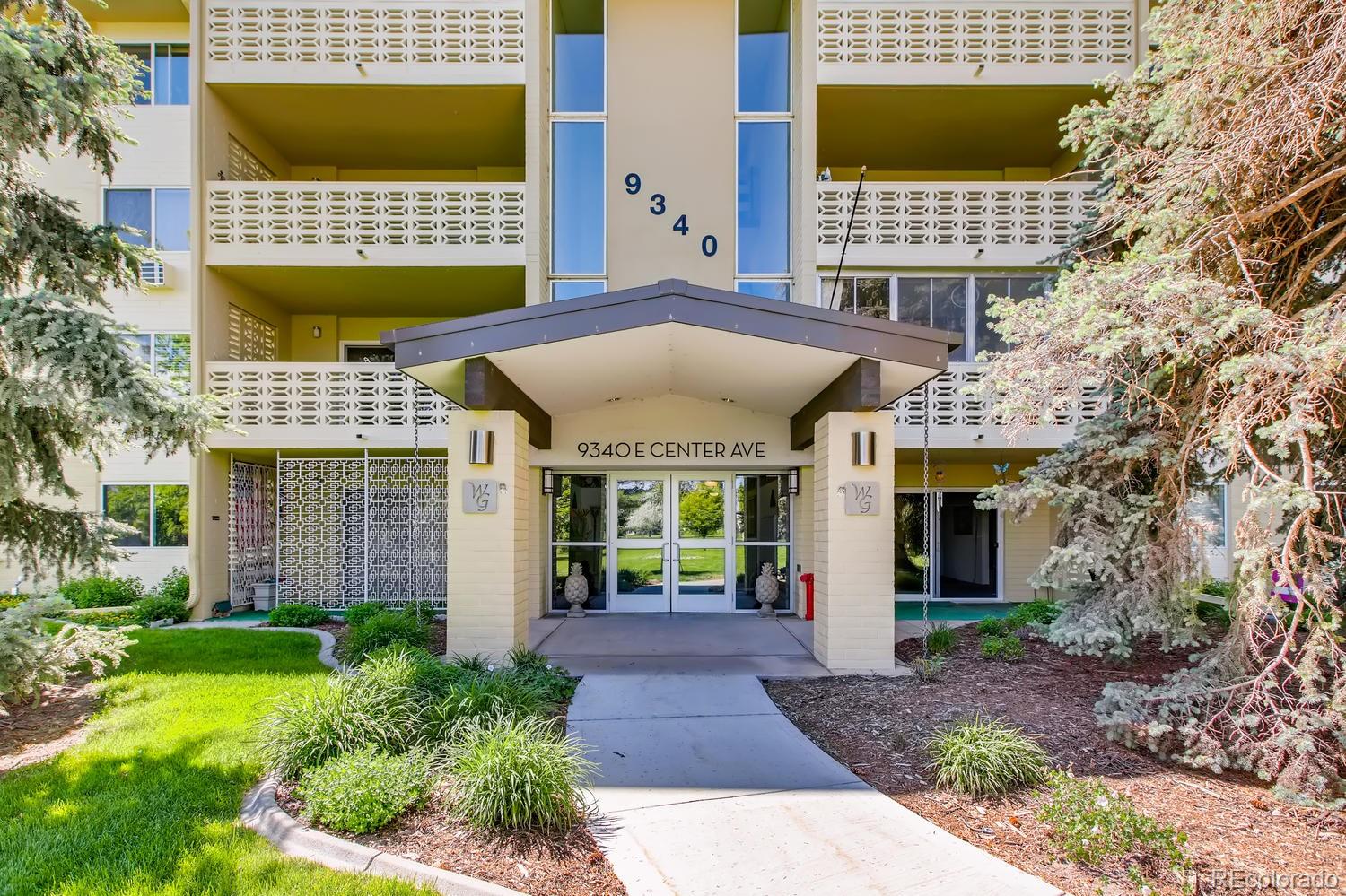 9340 Center Avenue, Unit 6B Denver, CO 80247 - Photo 33 of 40 a view of building with yard