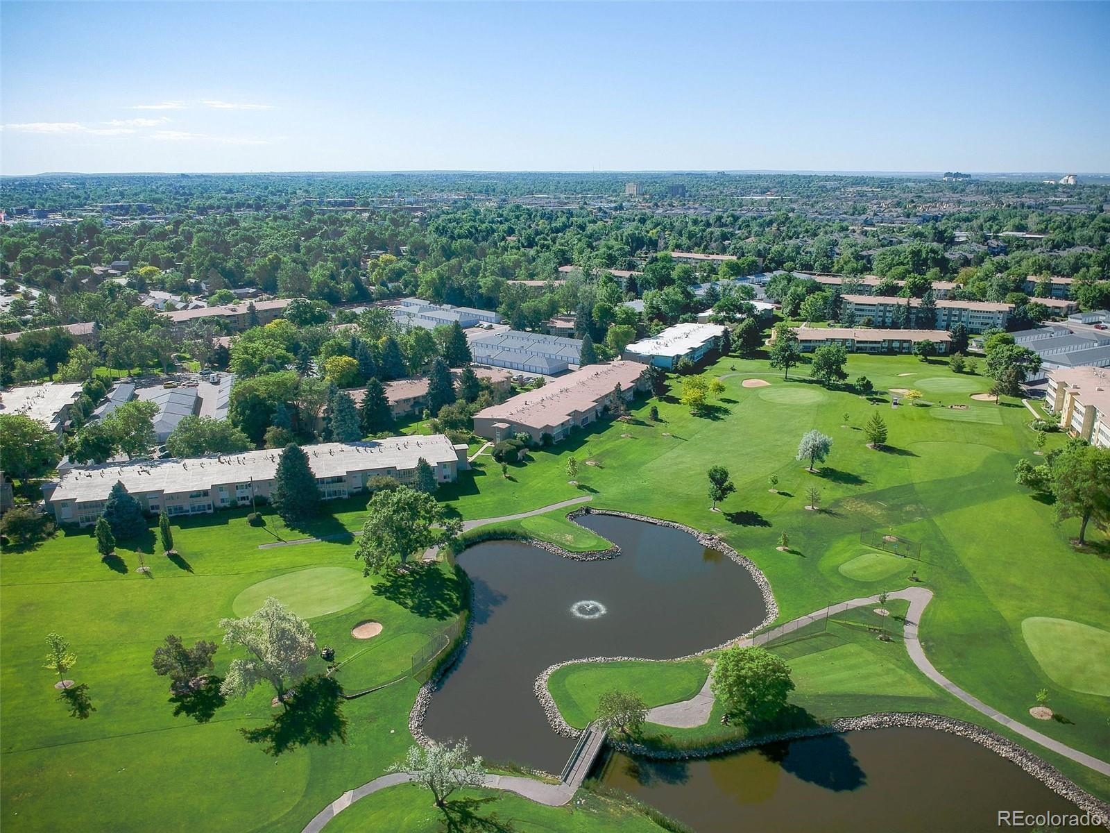 9340 Center Avenue, Unit 6B Denver, CO 80247 - Photo 38 of 40 an aerial view of a house with a yard