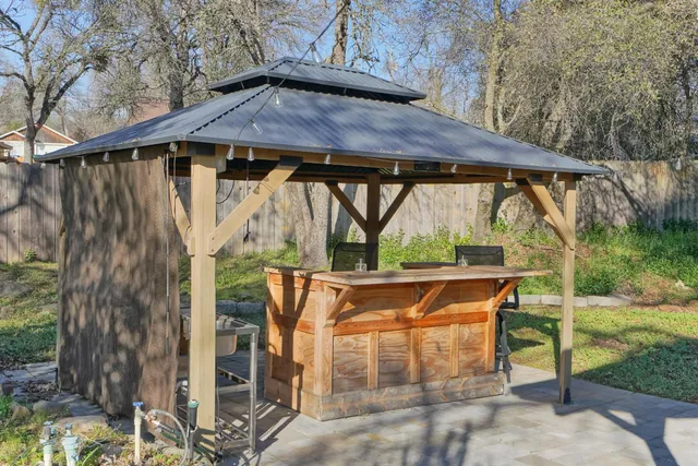 a view of a tree with a yard