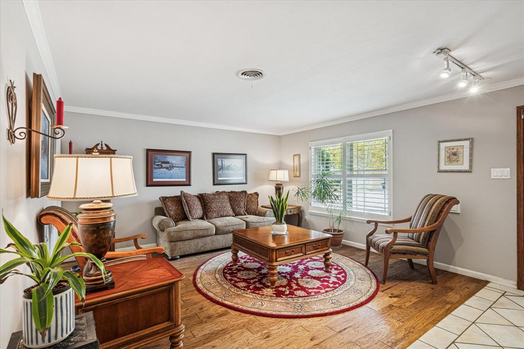 4209 Bilglade Road Fort Worth, TX 76109 - Photo 11 of 24 a living room with furniture and a large window