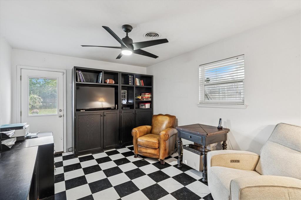 4209 Bilglade Road Fort Worth, TX 76109 - Photo 14 of 24 a living room with furniture and a window