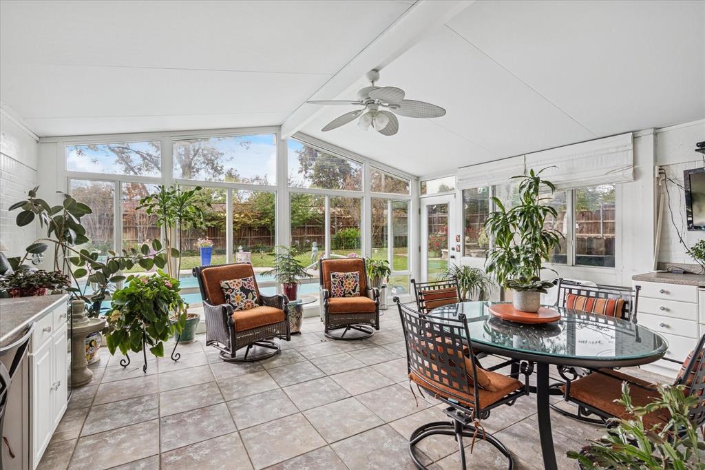 4209 Bilglade Road Fort Worth, TX 76109 - Photo 9 of 24 a living room with patio furniture and a potted plant