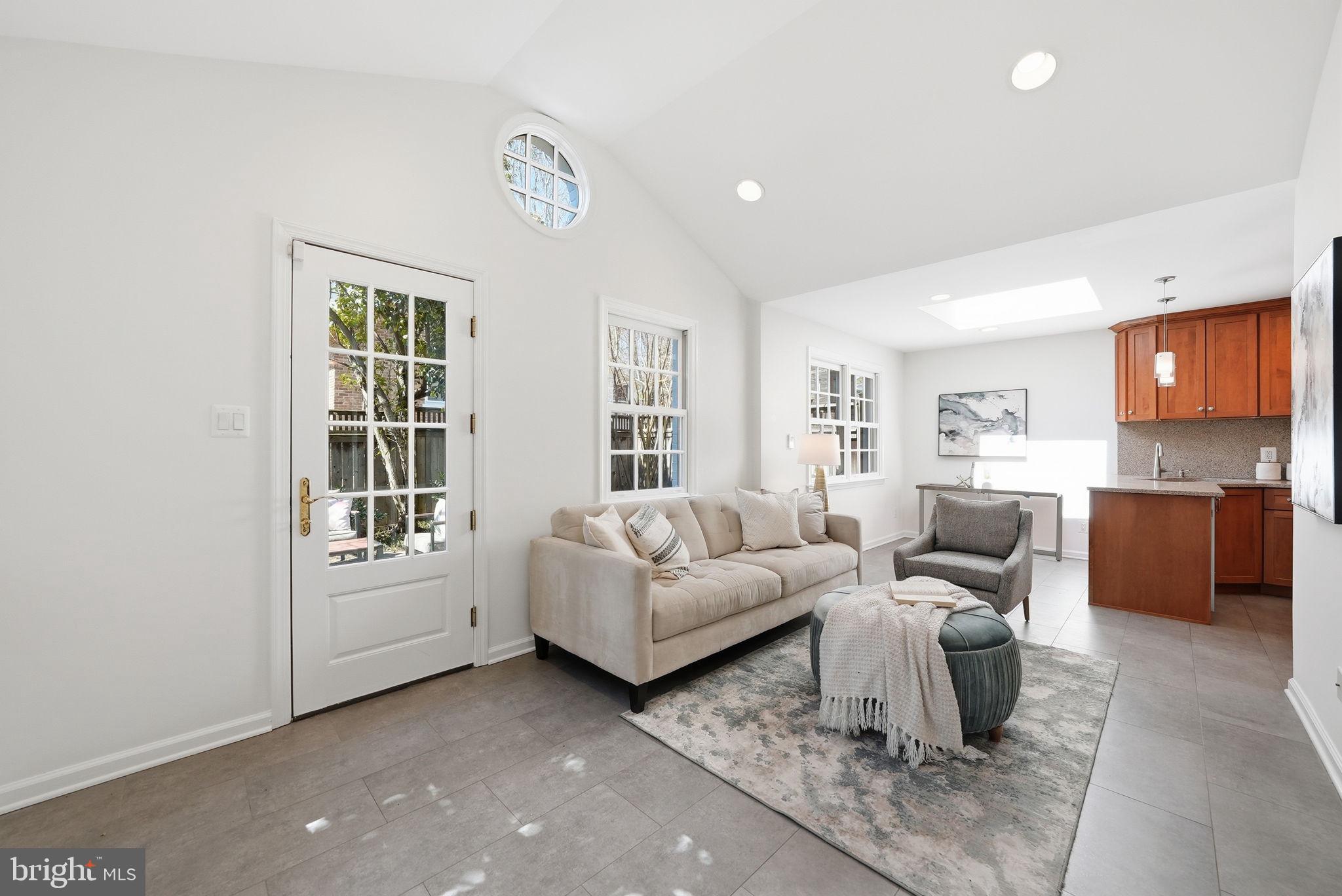 4600 Reno Road Northwest Washington, DC 20008 - Photo 16 of 60 Family Room- Vaulted Ceiling, lovely window detail