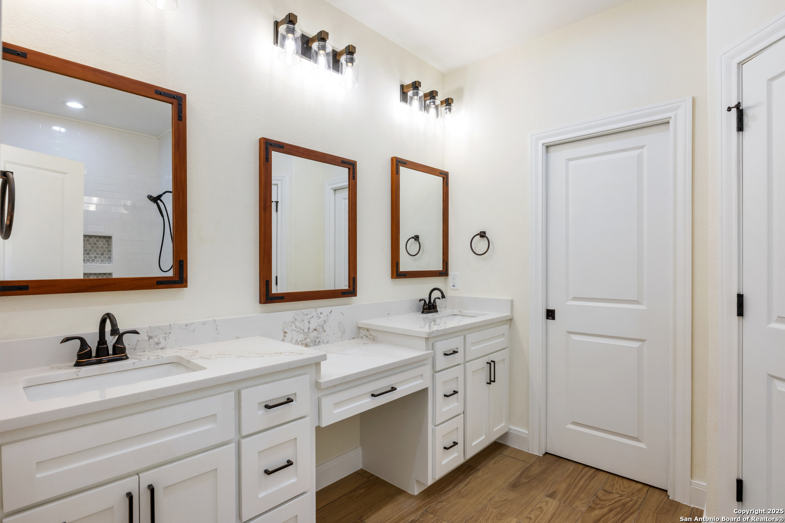32 Trophy Lane Poteet, TX 78065 - Photo 16 of 47 a bathroom with double vanity sink and mirror