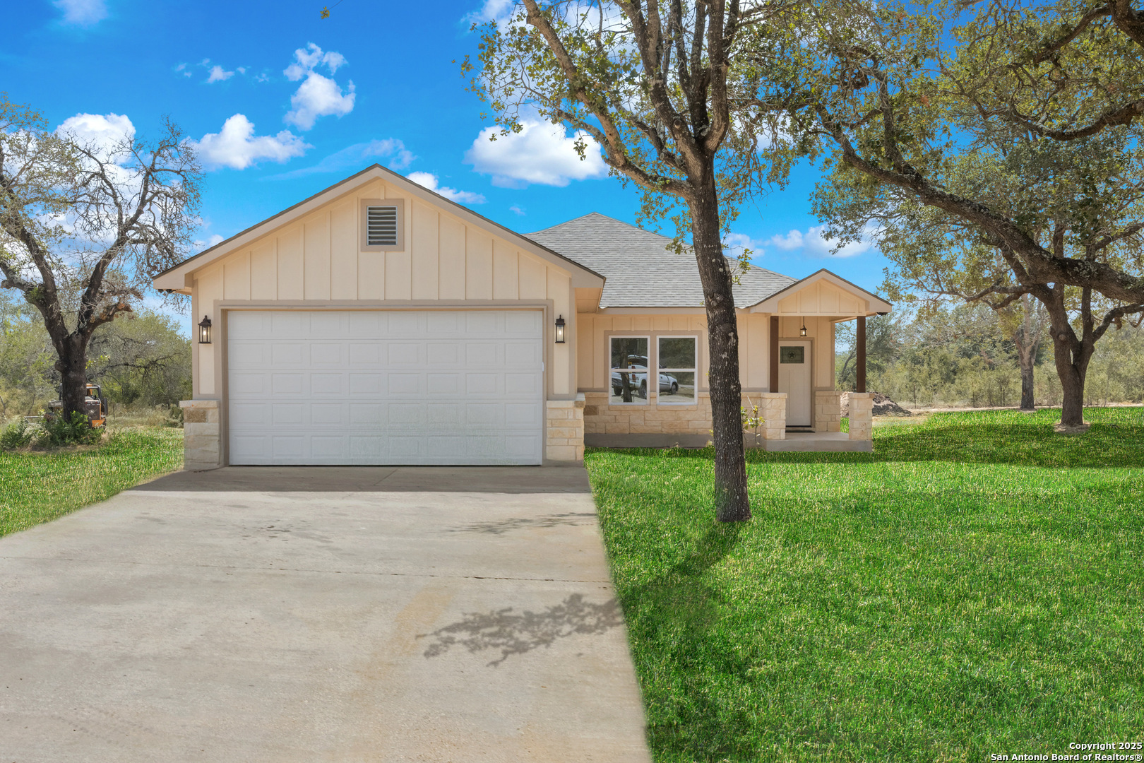 32 Trophy Lane Poteet, TX 78065 - Photo 2 of 47 a front view of a house with garden