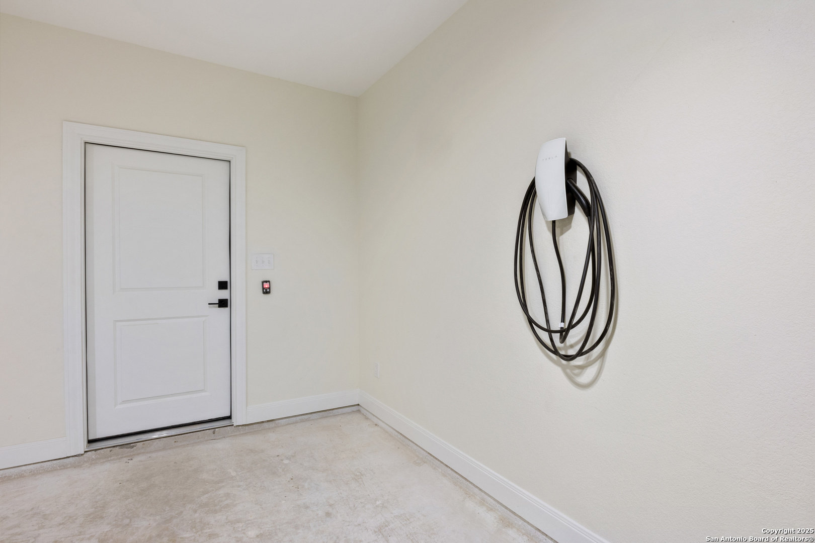 32 Trophy Lane Poteet, TX 78065 - Photo 25 of 47 a view of a room with rack on the wall