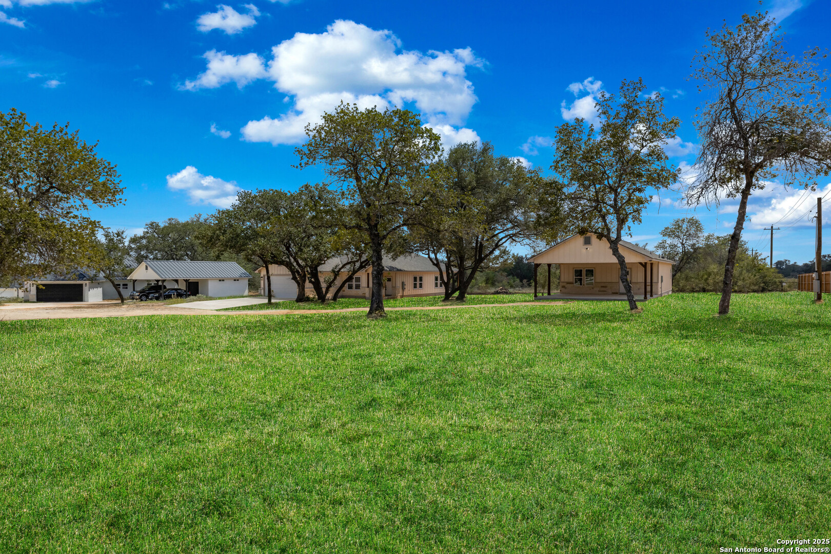 32 Trophy Lane Poteet, TX 78065 - Photo 43 of 47 a view of house with garden