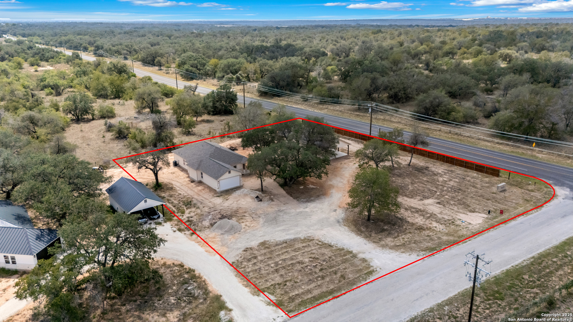 32 Trophy Lane Poteet, TX 78065 - Photo 45 of 47 a view of a mountain from a yard