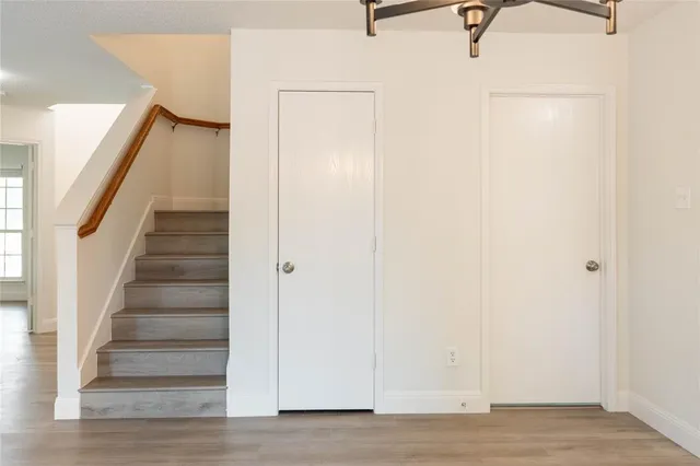 a view of entryway with wooden floor