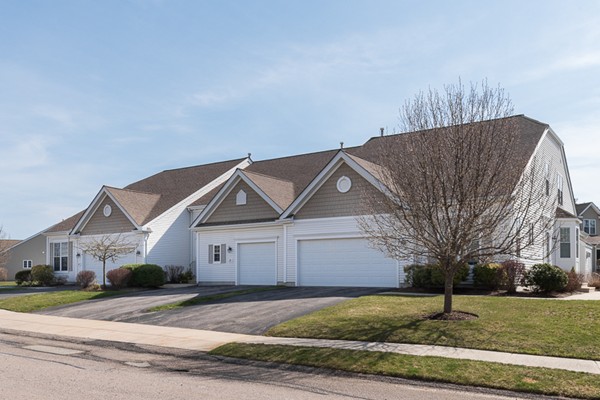 22 Spyglass Landing Drive, Unit 22 Marshfield, MA 02050 - Photo 1 of 25 a view of a house with a yard