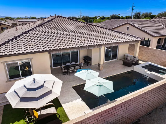 a view of a patio on the roof deck