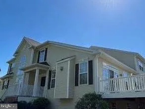 a view of front of house with stairs
