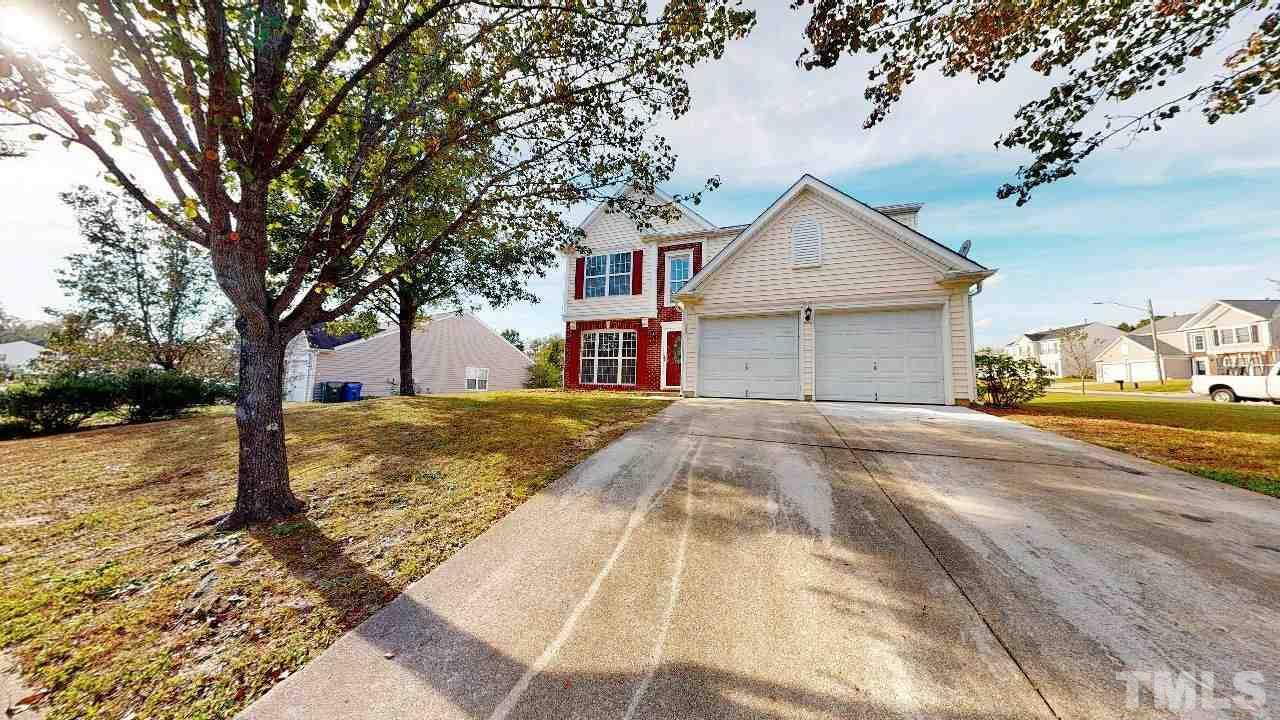 2901 Tuckland Drive Raleigh, NC 27610 - Photo 1 of 28 a view of a house with snow on the road