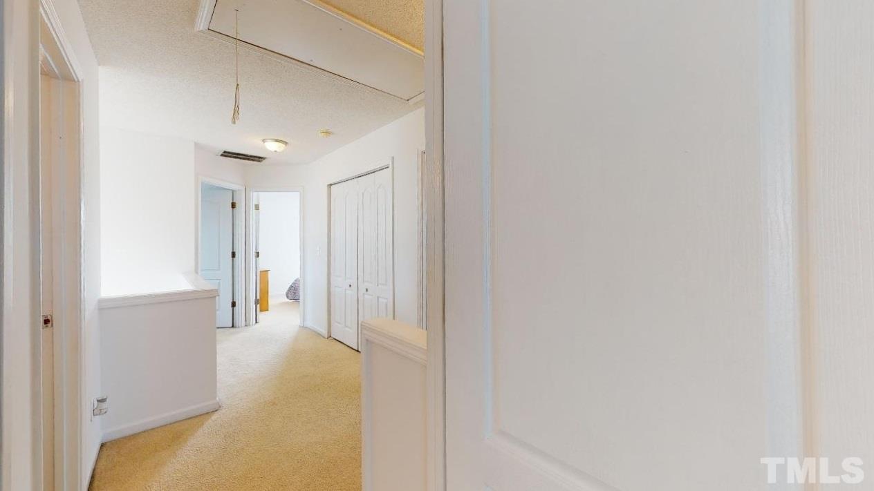 2901 Tuckland Drive Raleigh, NC 27610 - Photo 14 of 28 a view of a livingroom from a hallway